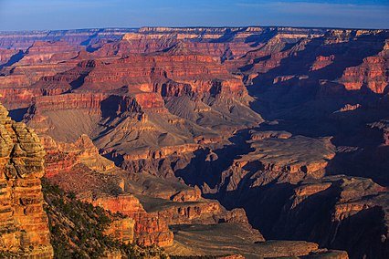 426px-Dawn_on_the_S_rim_of_the_Grand_Canyon_(8645178272).jpg