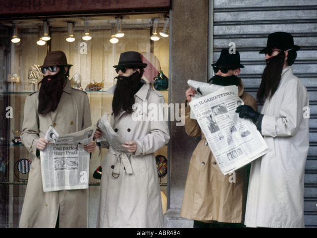 carnival-costume-spies-with-newspapers-fedoras-and-false-beards-venice-abr484.jpg