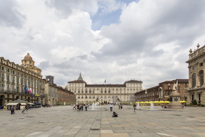 turin-italy-june-piazza-castello-central-baroque-square-turin-italy-tourists-visiting-piazza-castello-centr-turin-italy-121939444.jpg